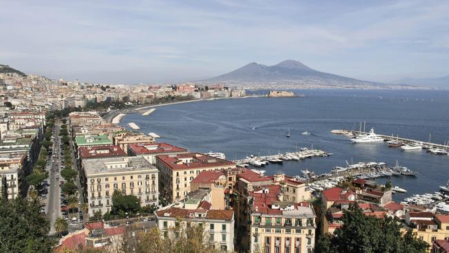 A view of the Naples harbour, with Mount Vesuvius in the background.