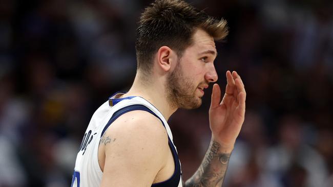 DALLAS, TEXAS - MAY 24: Luka Doncic #77 of the Dallas Mavericks reacts to a play during the second quarter against the Golden State Warriors in Game Four of the 2022 NBA Playoffs Western Conference Finals at American Airlines Center on May 24, 2022 in Dallas, Texas. NOTE TO USER: User expressly acknowledges and agrees that, by downloading and or using this photograph, User is consenting to the terms and conditions of the Getty Images License Agreement. (Photo by Tom Pennington/Getty Images)