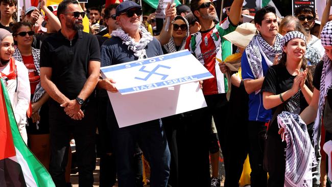 Al Yazbek with a Nazi like symbol on it at the protest in Hyde Park. Picture: NewsWire / Damian Shaw