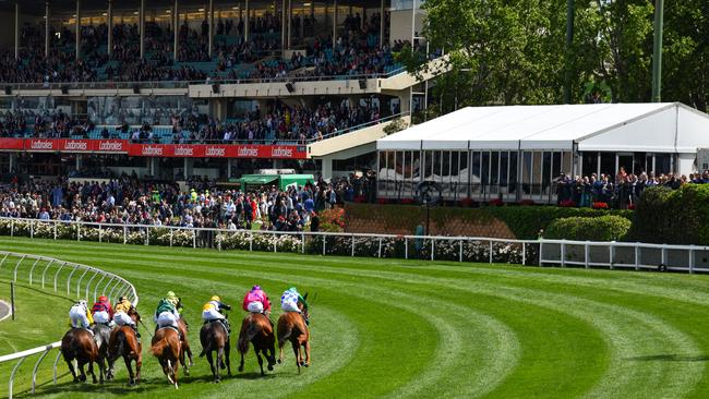 Jockey Dwayne Dunn rides Soul Patch (pink) to victory in race 6, the Drummond Golf Vase, during Cox Plate Day at Moonee Valley Racecourse, Melbourne, Saturday, October 26, 2019. (AAP Image/Vince Caligiuri) NO ARCHIVING, EDITORIAL USE ONLY