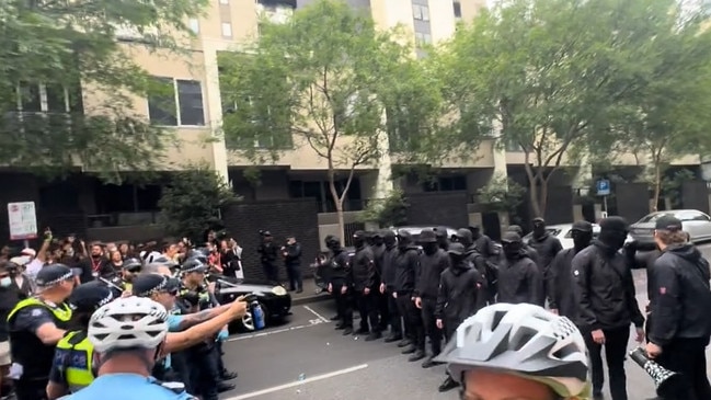 Police confront a group of suspected neo-Nazis at a pro-refugee rally. Picture: TikTok/permanentvisaforrefugees