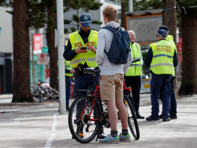 Police stopped bike riders on Manly Beach in May, 2023, as part of safety awareness campaigns. Picture: NCA NewsWire / Nikki Short