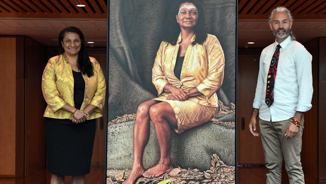 Nova Peris with her official portrait and Dr Jandamarra Cadd.Picture: AAP.