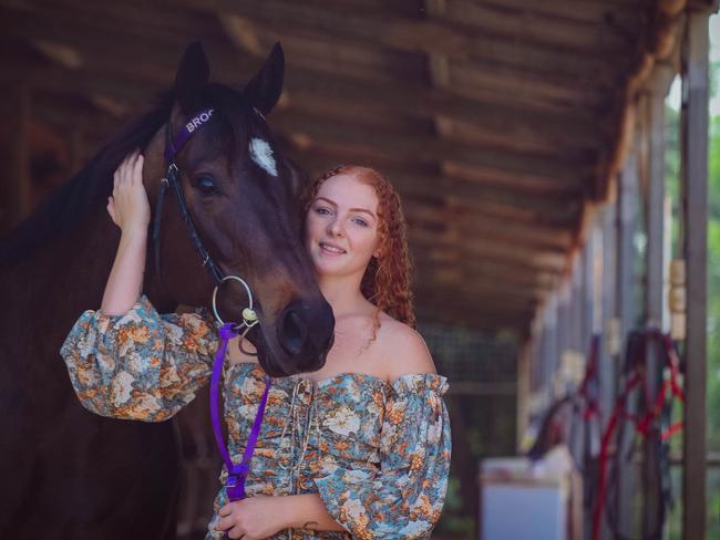 Trainer Nicole Bruggemann’s daughter Maddi Viney with 2021 Darwin Cup champion, Highly Decorated. Picture: Glenn Campbell