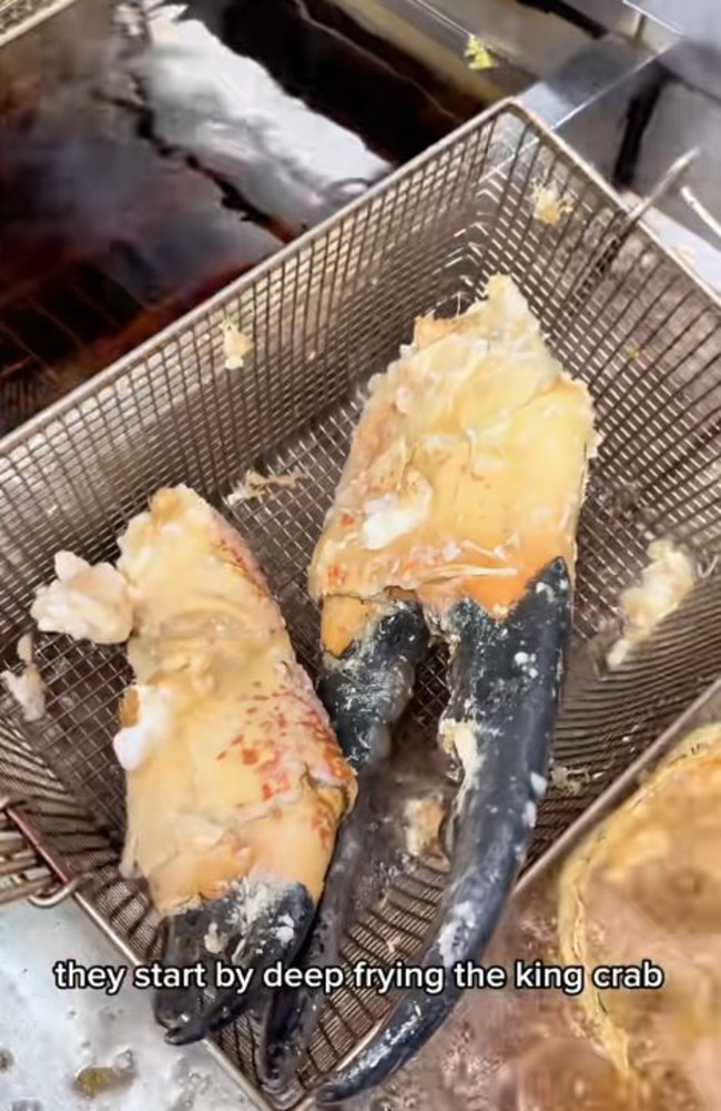 The claws being deep-fried. Picture: TikTok/EatingWithTodd