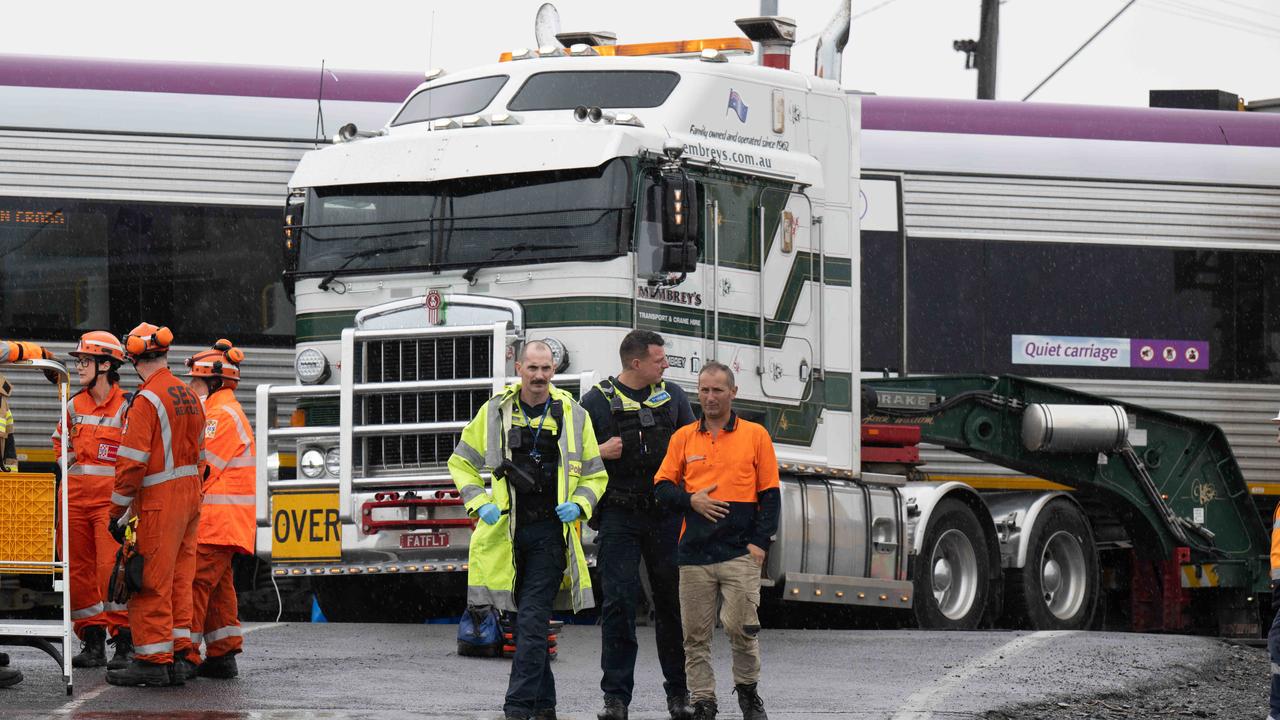 Emergency crews at the scene of a fatal crash in North Shore on Monday. Picture: Brad Fleet