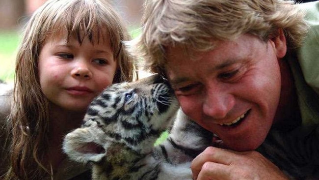 A December 24, 2003 photo of the Crocodile Hunter Steve Irwin, and his daughter Bindi Irwin with one of three six-week-old Bengal tiger cubs at Australia Zoo Picture: Supplied