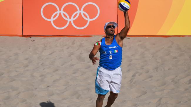 Adrian Carambula of Italy has been thrilling crowds at Copacabana beach with his unique serving style.