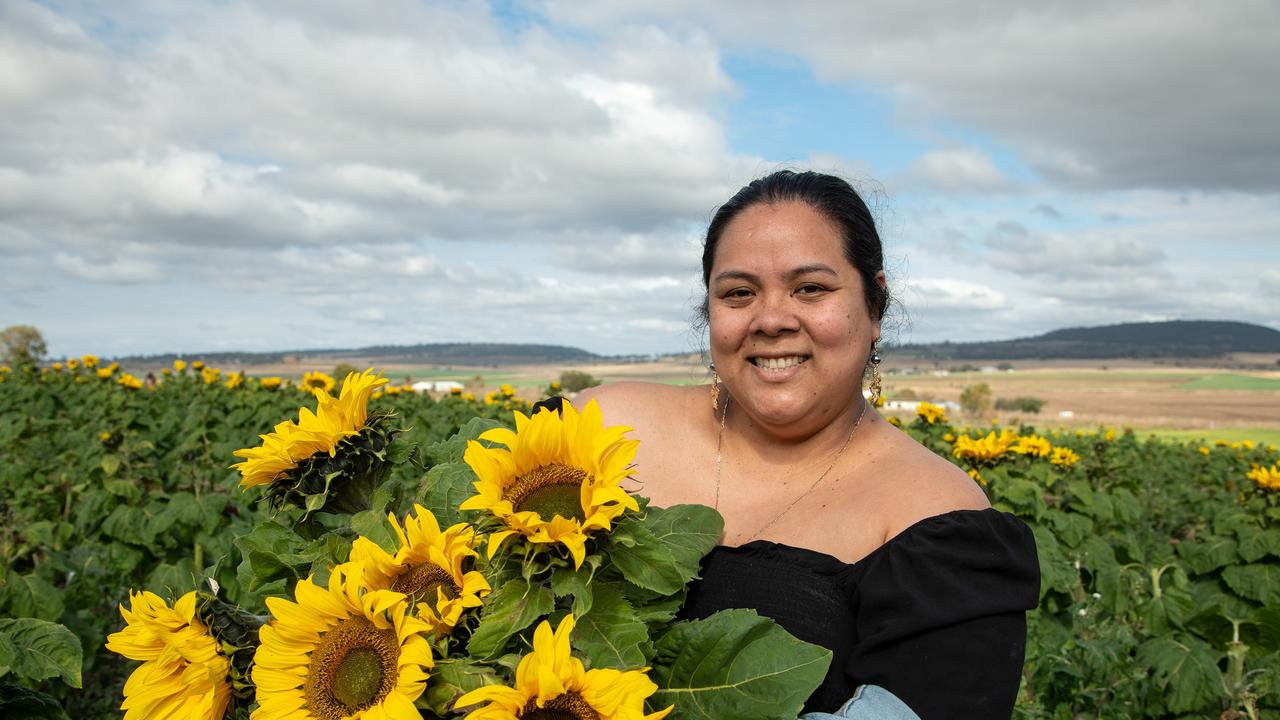 Enjoying her first visit to a sunflower field is Savelina Curry.Open day at Warraba Sunflowers, Cambooya. Saturday June 29th, 2024