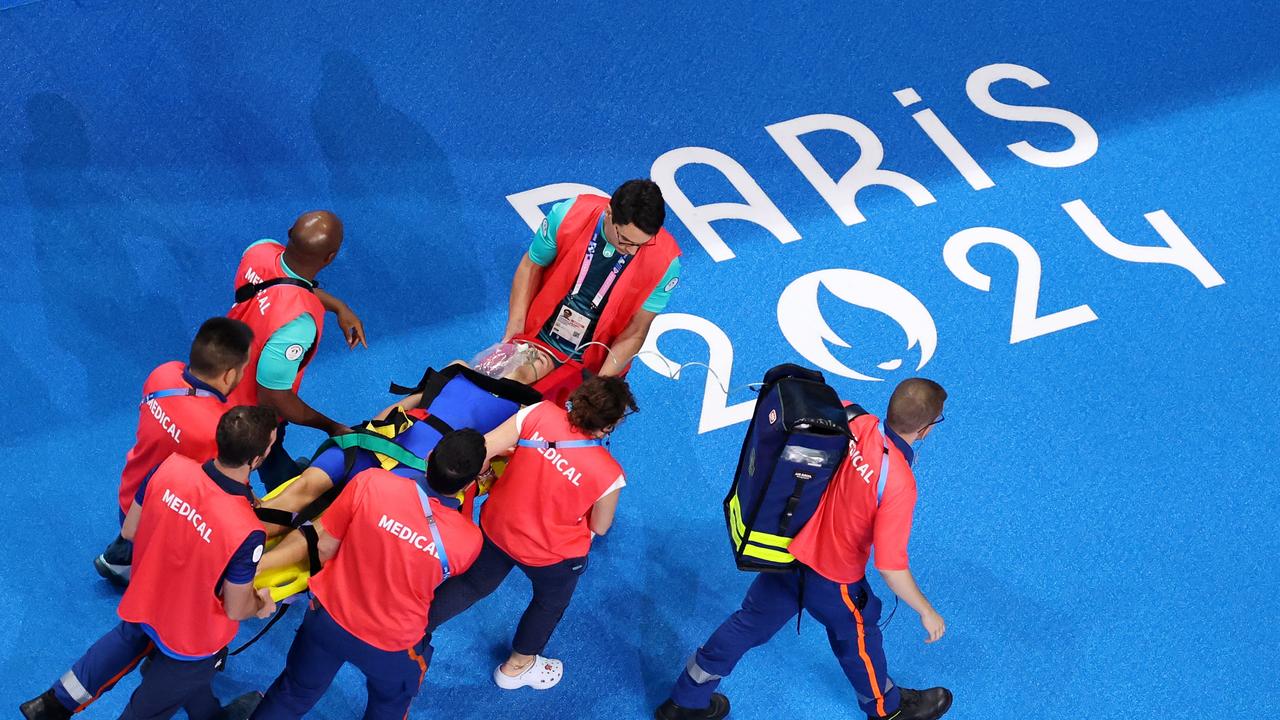 Potocka being carried out of the arena. (Photo by Al Bello/Getty Images)