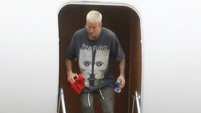 Pop star Justin Beiber disembarks in Sydney ahead of his show tonight. Picture: Adam Taylor