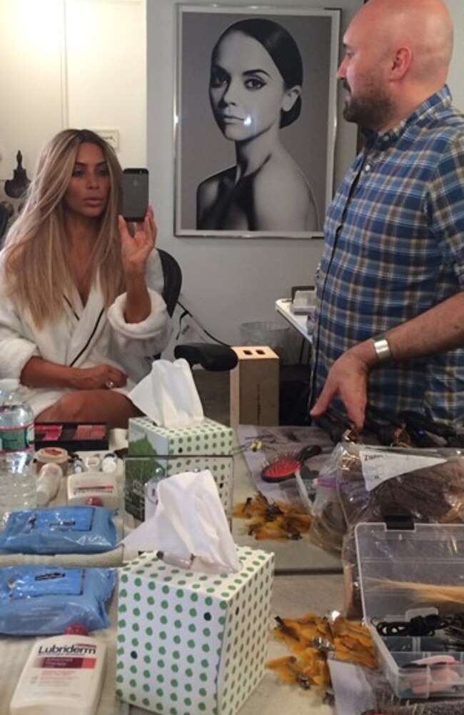 Back to blonde ... Kim Kardashian sitting in stylist Serge Normant’s chair. Picture: Instagram