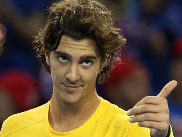 GLASGOW, SCOTLAND - SEPTEMBER 20 : Thanasi Kokkinakis of Australia celebrates his victory over Dan Evens of Great Britain during his singles match on the third day of the Davis Cup Semi Final 2015 between Great Britain and Australia at the Emirates Arena on September 20, 2015 in Glasgow Scotland. (Photo by Mark Runnacles/Getty Images)