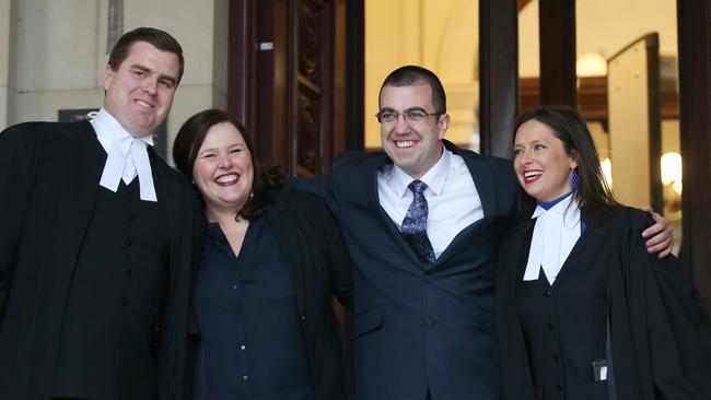 Faruk Orman (second right) with his legal team, spent 12 years in jail for a crime he has always maintained he did not commit and was released last month.