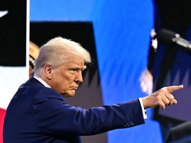 TOPSHOT - US President Donald Trump gestures as he speaks during the FII PRIORITY Miami 2025 Summit (Future Investment Initiative) at the Faena Hotel & Forum in Miami Beach, Florida, February 19, 2025. (Photo by ROBERTO SCHMIDT / AFP)