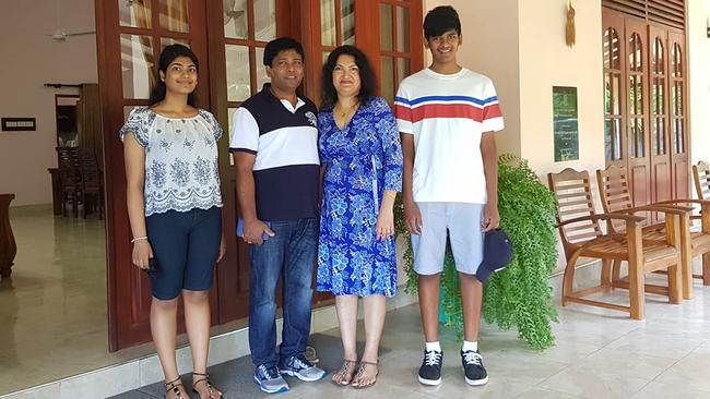 Calvin Wijeweera, far right, with his sister Ovindi and parents Sandun and Anoma.