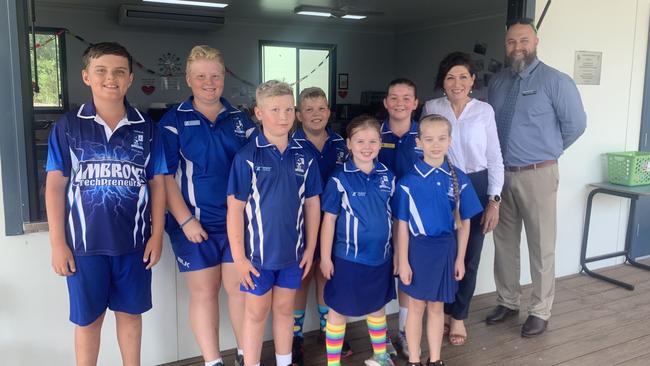 Communities and Housing Minister Leeanne Enoch with Ambrose State School Principal Andrew Collis and students who have benefited from the school's breakfast program.