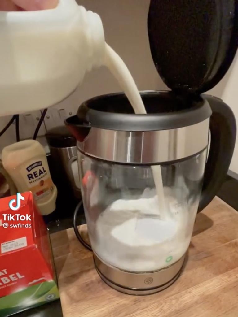 First the American adds milk STRAIGHT INTO THE KETTLE. Picture: TikTok/@Swfinds