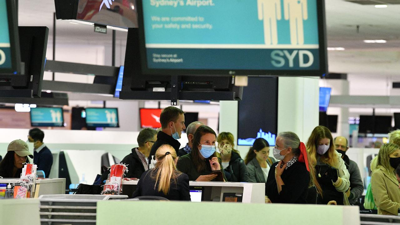 Aussies were quick to snap up flights across the ditch. Picture: Saeed Khan/AFP