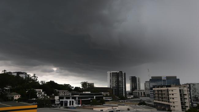 Storm clouds over Brisbane on Saturday. Picture: David Clark