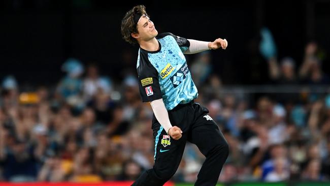 BRISBANE, AUSTRALIA - DECEMBER 07: Mitch Swepson of the Heat celebrates after dismissing Joe Burns of the Stars during the BBL match between Brisbane Heat and Melbourne Stars at The Gabba, on December 07, 2023, in Brisbane, Australia. (Photo by Albert Perez/Getty Images)