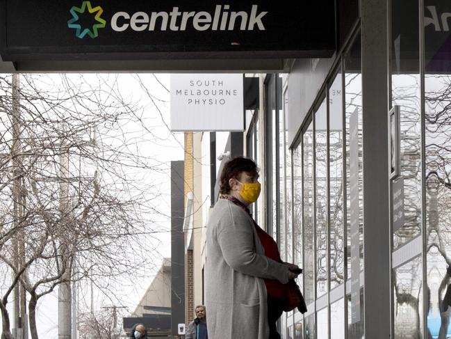 MELBOURNE, AUSTRALIA - NewsWire Photos AUGUST  31 2020: A woman waits outside Centrelink in South Melbourne on Monday during stage 4 COVID-19 lockdowns across Melbourne.Picture: NCA NewsWire / David Geraghty