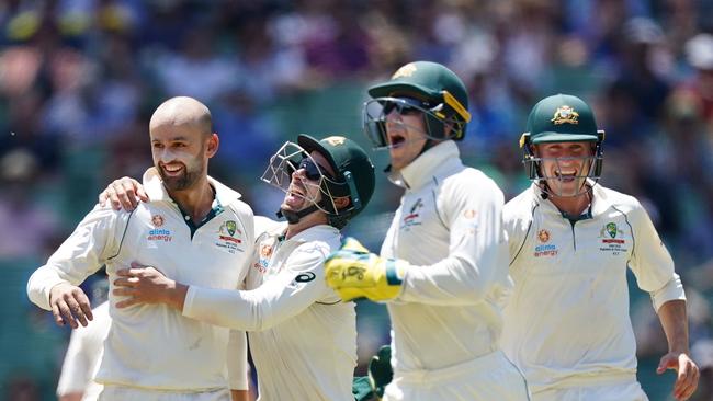 Nathan Lyon, Matthew Wade, Tim Paine and Marnus Labuschagne celebrate at the famous MCG. Picture: AAP