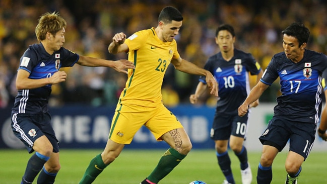 Tom Rogic (C) in action against Japan.