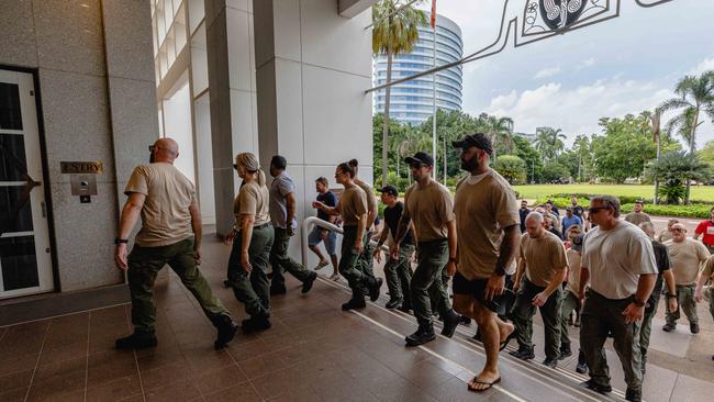 More than 40 Corrections officers and United Workers Union staff marched into the NT Parliament House on Tuesday February 11, 2025. Picture: Pema Tamang Pakhrin