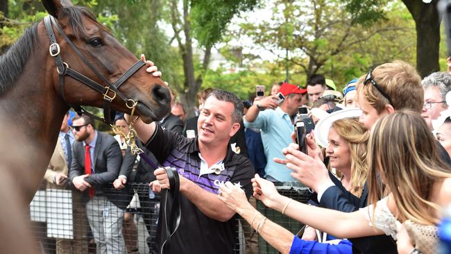 Fans line up to get close to Winx at Moonee Valley. Picture: Jay Town