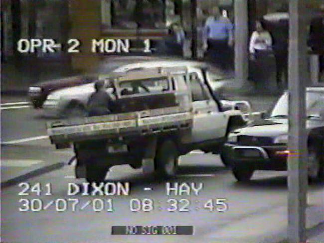 CCTV footage of Jeff Garland in the tray of a ute he was trying to stop in Redfern when he was a police officer.