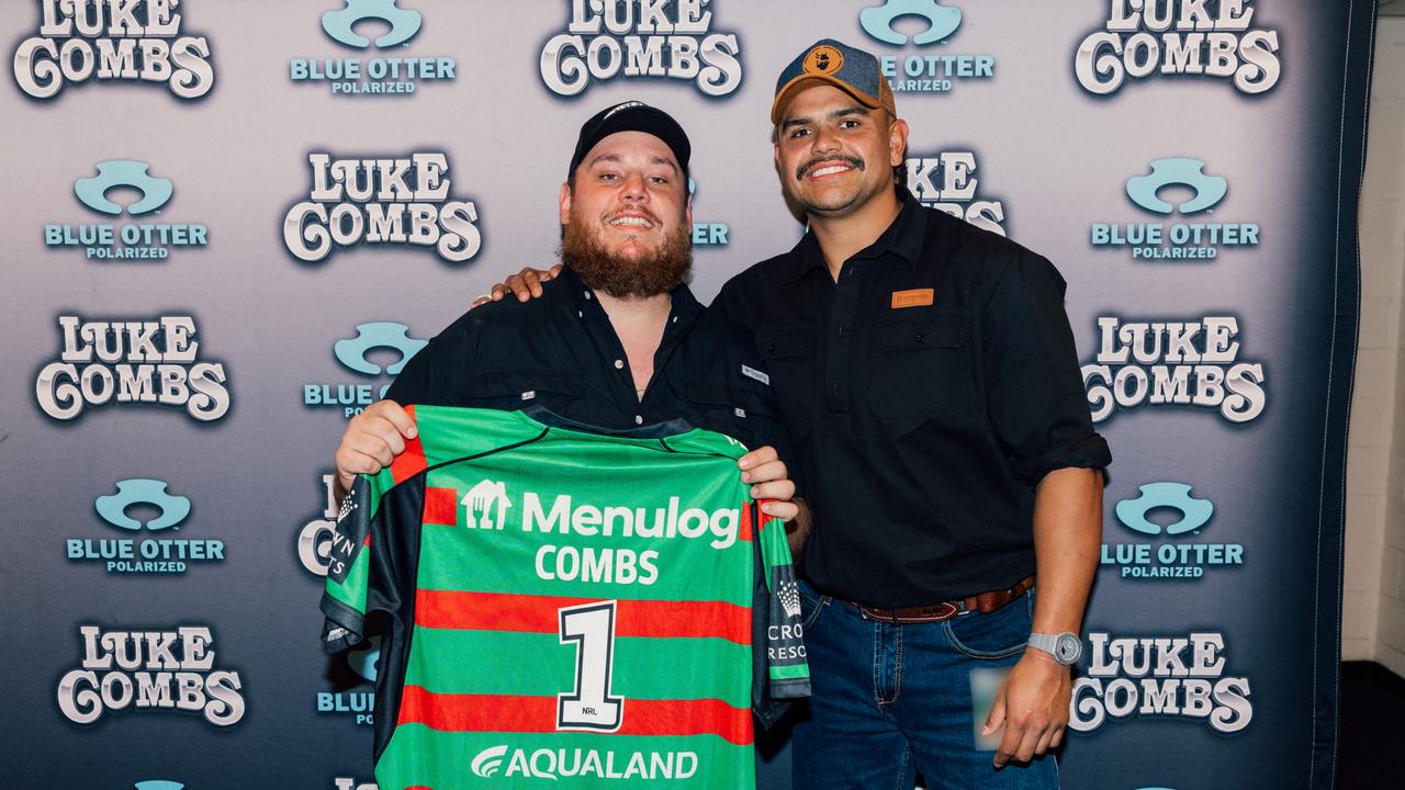 Latrell Mitchell presents American country music star Luke Combs with a Rabbitohs jersey at his concert. Picture: Supplied