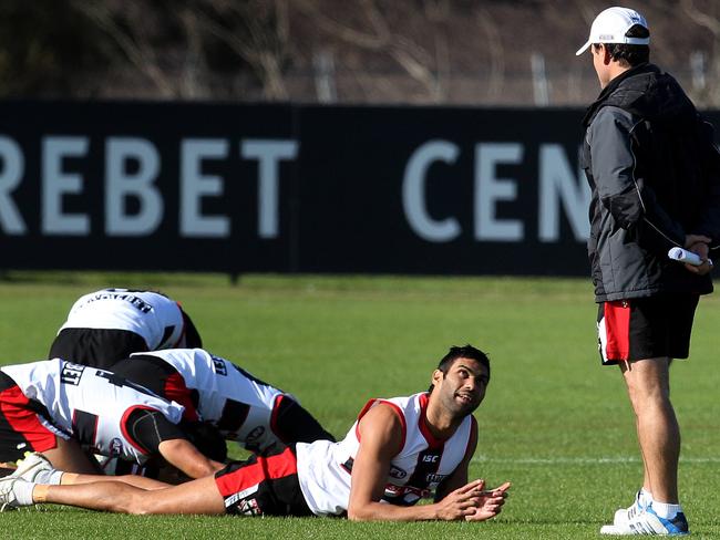 Raph Clarke talks to coach Scott Watters at training in June, 2012. Picture: Michael Klein.