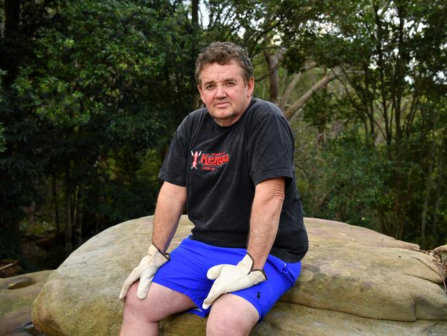 Gary Evans in bushland near his home in Berowra Heights where police have been searching for Ms Yu. Picture: Joel Carrett