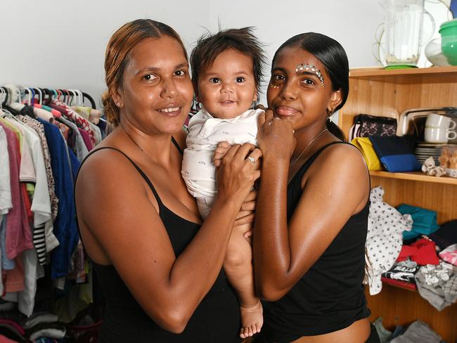 Naomi Leftwich with her son Darius, 6mths, and daughter Hazeldawn , 13, inside the Garbutt Community Centre. Picture: Shae Beplate.