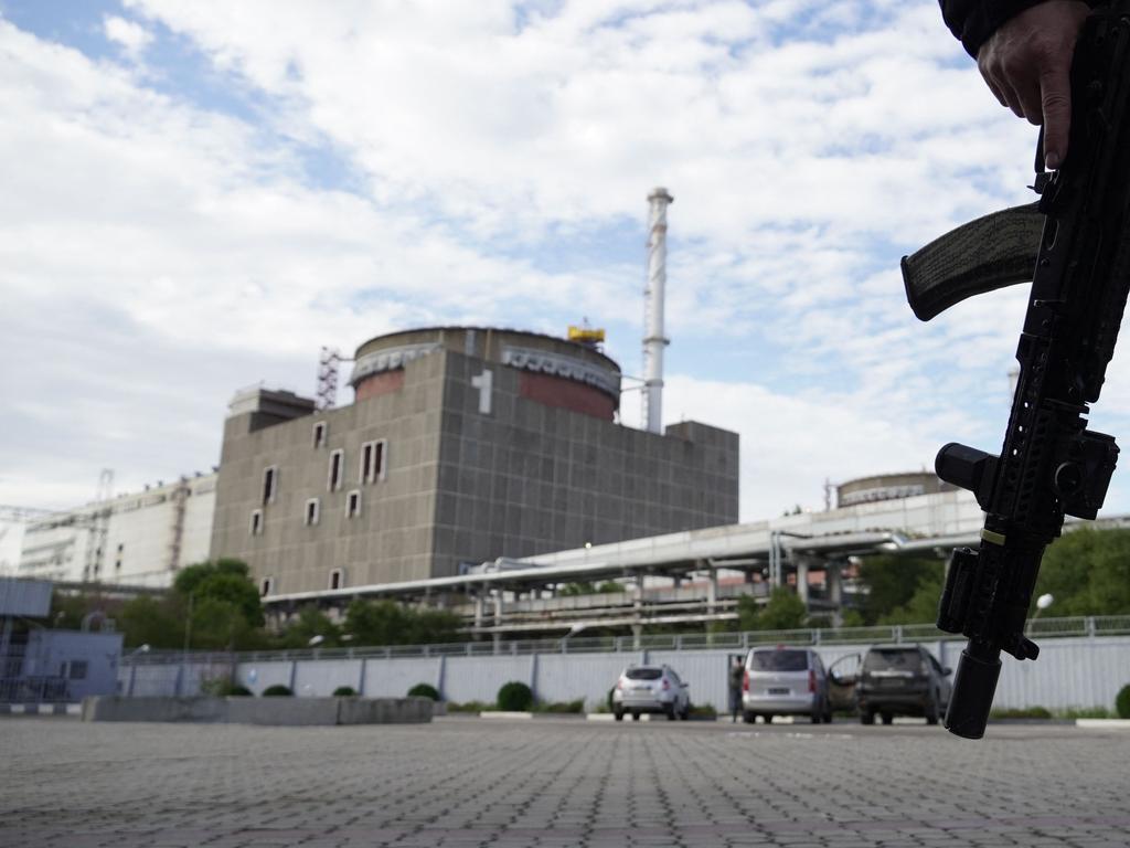 A security person standing in front of the Zaporizhzhia Nuclear Power Plant amid the ongoing Russian military action in Ukraine. Picture: AFP