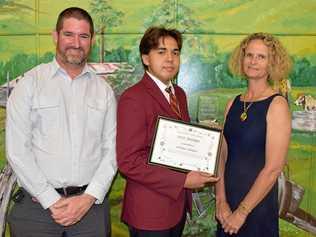 TOP AWARD: Dux Joshua Schaper with head of curriculum David Callaway and principal Beth Everill at the Biggenden State School's award night. Picture: Erica Murree