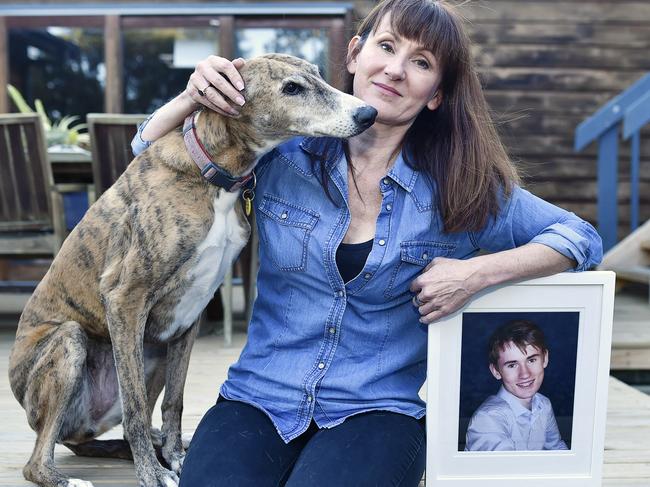 Kim with Danie's dog Bella. Kim Edgar lost her teenage son Daniel to suicide last year, and knows the shortfalls of the region's mental health system. Picture: Alan Barber