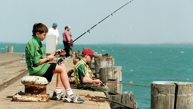 Collinsville lads, Trent Crouther, 12 (front) and Aaron Crouther, 13 (rear) on the jetty. Picture: Scott Radford, Bowen, Wet Weekend Fishing Classic and Entertainment.