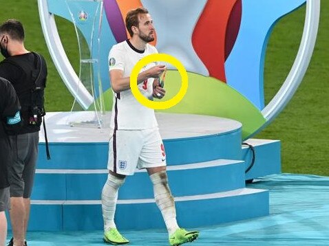 Harry Kane looks dejected after receiving his runners-up medal.