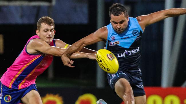 Jarrod Stokes of the Darwin Buffaloes against Marcus Totham of Wanderers ahead of their Round 2 2023-24 NTFL clash. Picture: Celina Whan / AFLNT Media