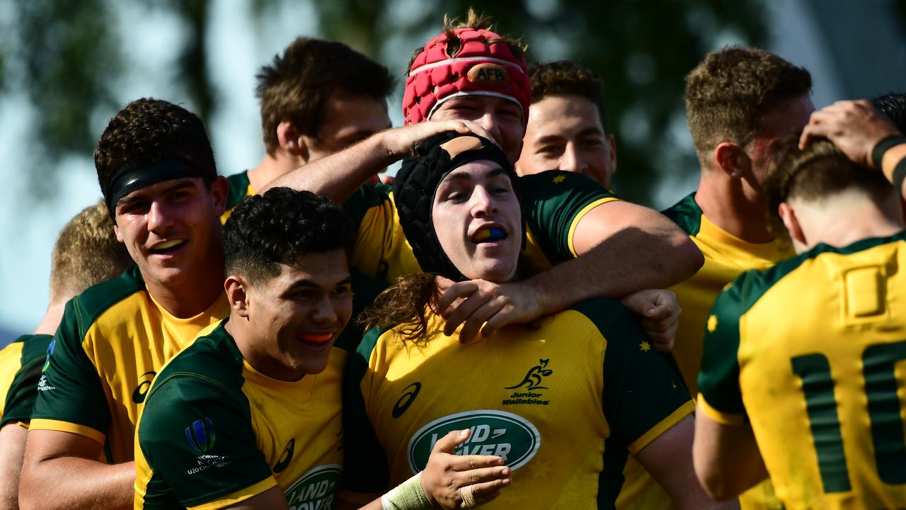 Lachlan Lonergan of Australia U20 celebrates with his teammates after scoring a try.