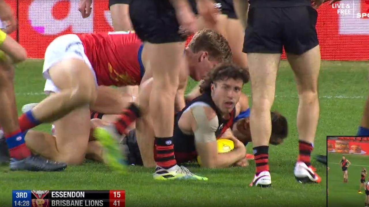 Andrew McGrath reacts in shock after being called for holding the ball.