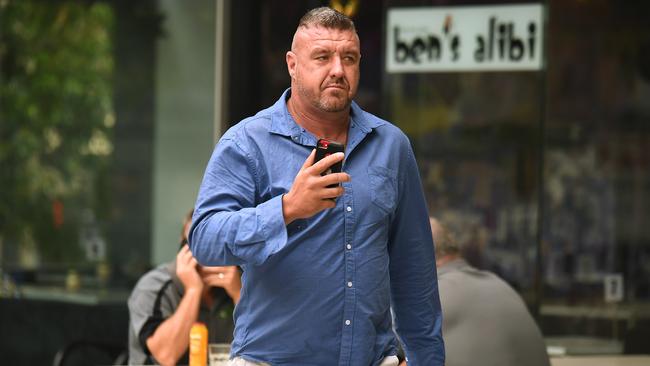 A The 45-year-old President of the Gold Coast Chapter of the Hells Angels Outlaw Motorcycle Gang, Gregory Pearce arrives for sentenced in Brisbane today. Picture: AAP