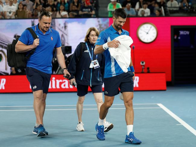 Serbia's Novak Djokovic leaves the court for a medical timeout. Picture: AFP