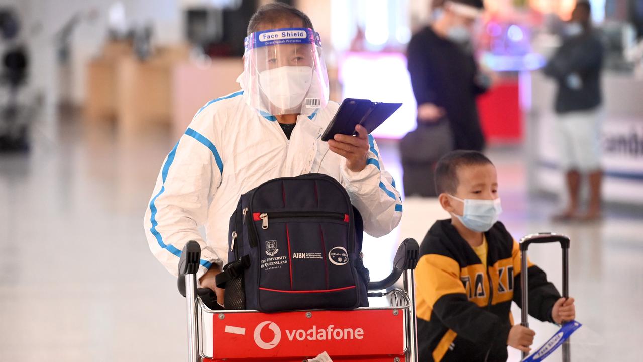 International travellers return to Sydney International Airport with Australia announcing new measures for incoming travellers in response to the emergence of the Omicron variant. Picture: NCA NewsWire / Jeremy Piper