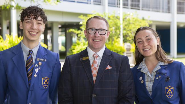 Trinity Catholic College captains Daniel Pereira and Perinn McDermott with newly appointed lay Principal Jesse Smith.