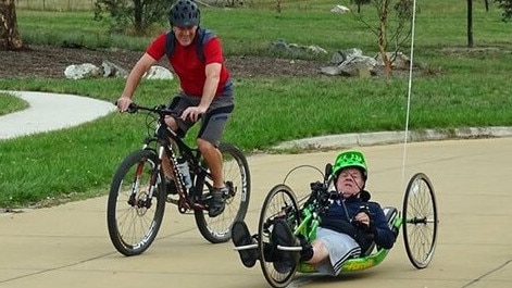 Andrew and his father, who will complete the final leg of the trip alongside his son using a handcycle.