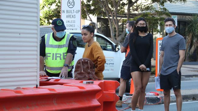 Border bedlam on the QLD/NSW border in Griffith St Coolangatta. Police and Emergency Services stop members of the public on the border for questioning. Picture Glenn Hampson