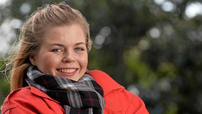 The Autumn wind is ready to arrived and Anneliese Hinchliffe is rugged up for the cold in Memorial Park, Gympie. Picture: Patrick Woods